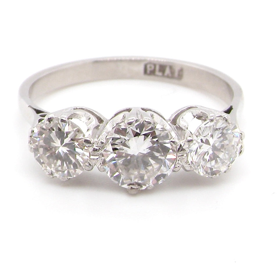 art deco three stone diamond trilogy ring