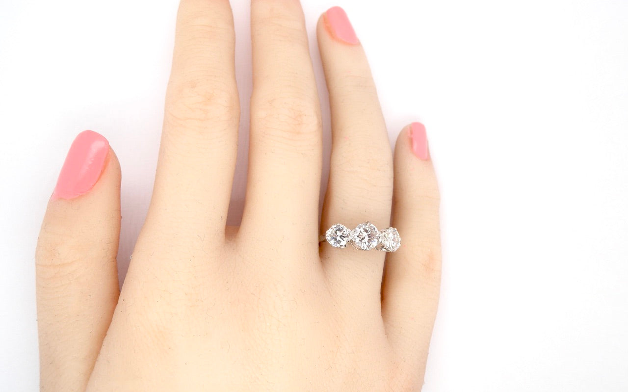 Diamond trilogy engagement ring