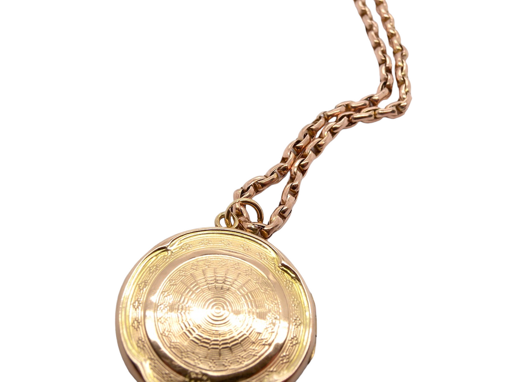 gold back and front locket 
