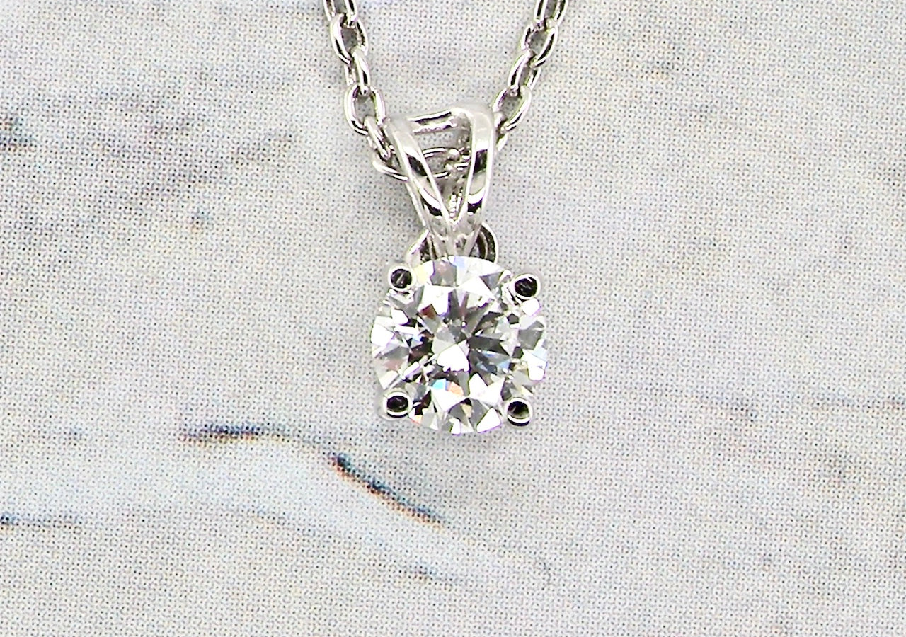 half carat diamond pendant