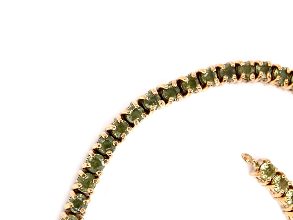 gold peridot line bracelet