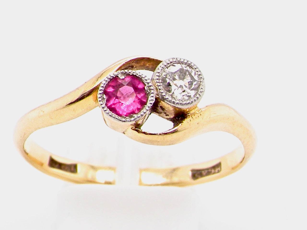 vintage two stone ruby and diamond ring