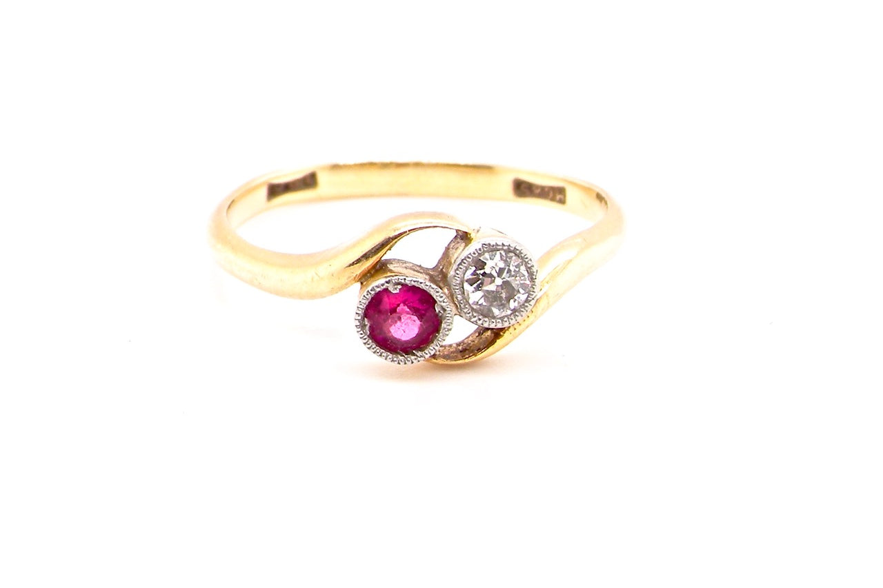 vintage two stone ruby and diamond cross over ring
