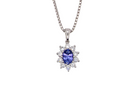 18 carat white gold pendant featuring a captivating oval tanzanite
