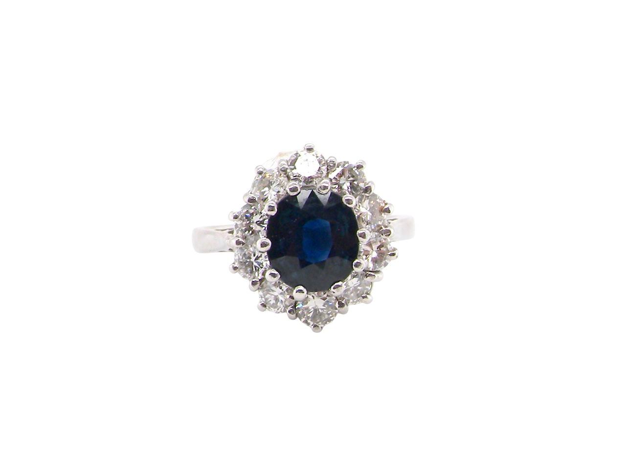 1970s A traditional sapphire and diamond cluster ring