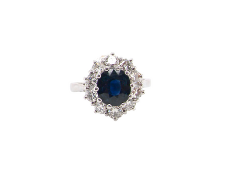 1970s A traditional sapphire and diamond cluster ring