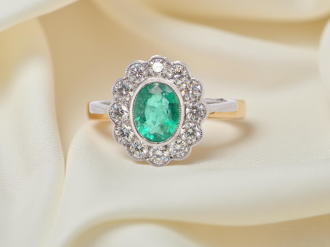 A fabulous Emerald and Diamond cluster ring