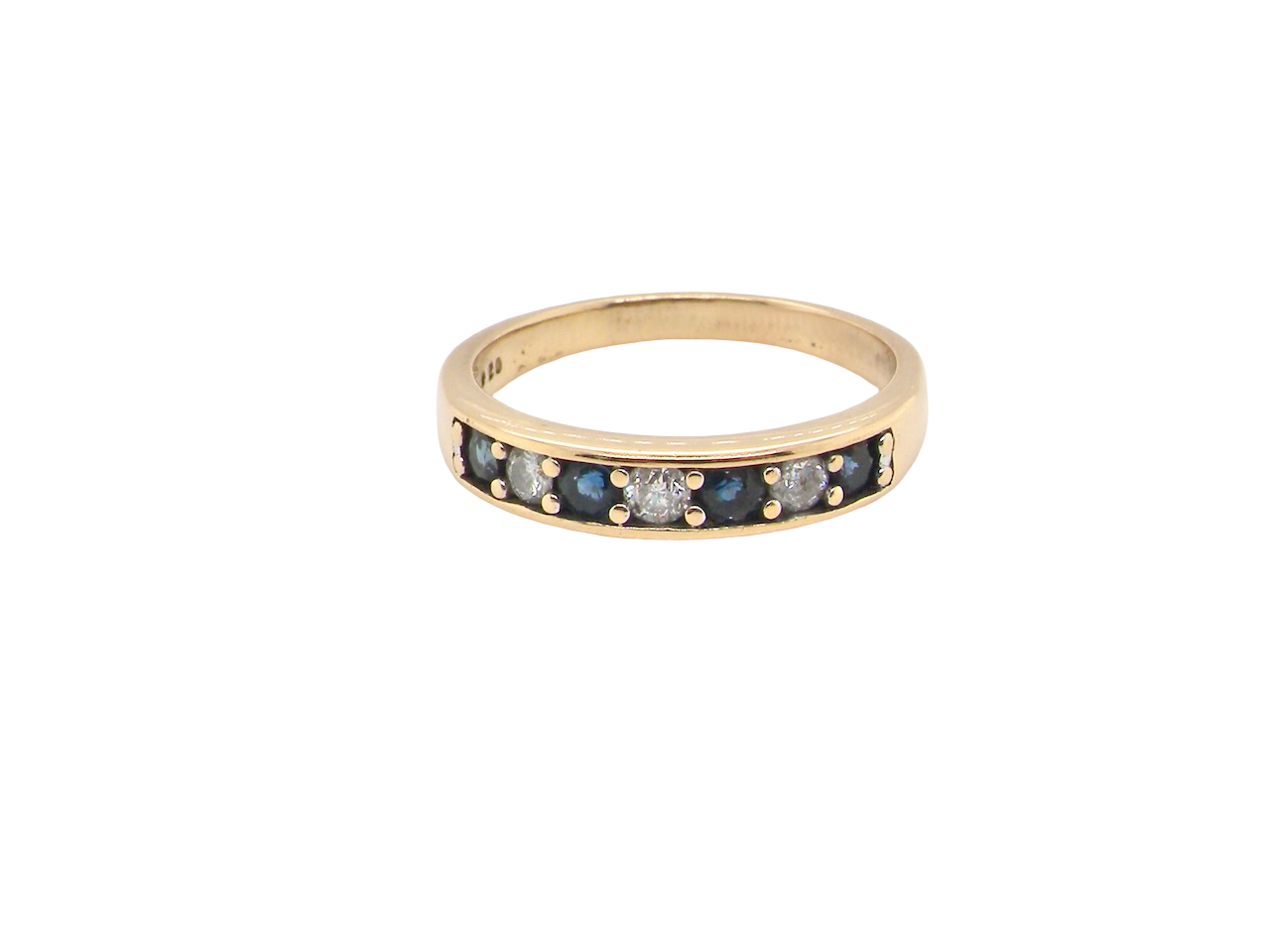 An 18 carat gold Sapphire and Diamond eternity ring