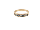 An 18 carat gold Sapphire and Diamond eternity ring