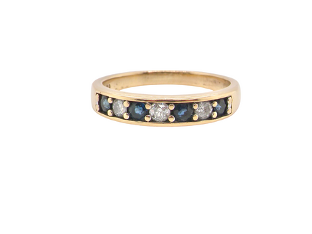 An 18 carat gold Sapphire and Diamond eternity ring