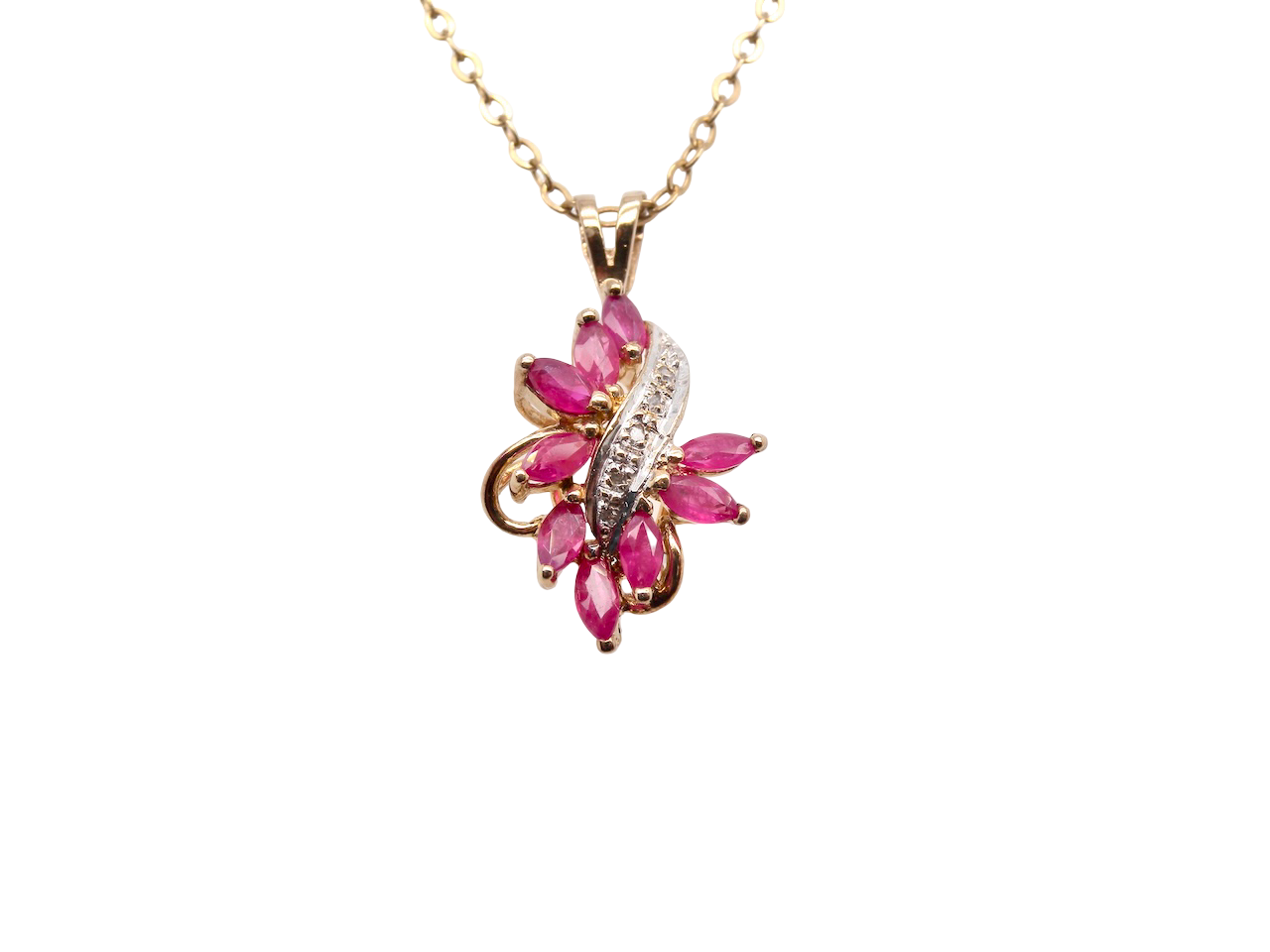 9 carat gold pendant. Features nine marquise shaped rubies,