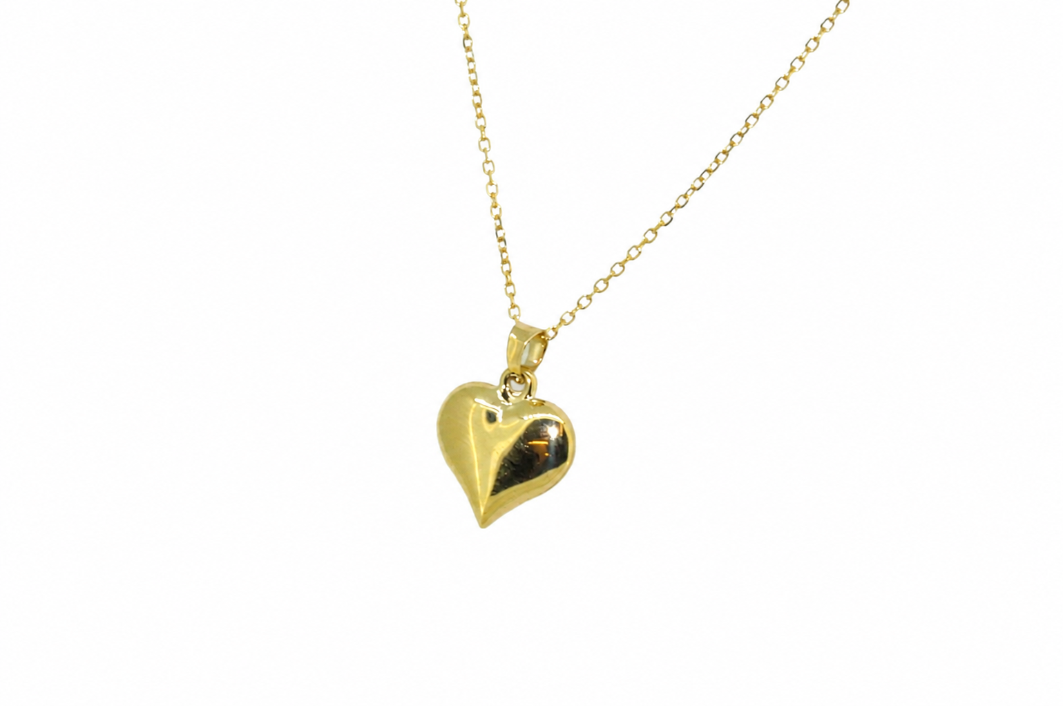 A 9ct gold patterned heart pendant reverse view