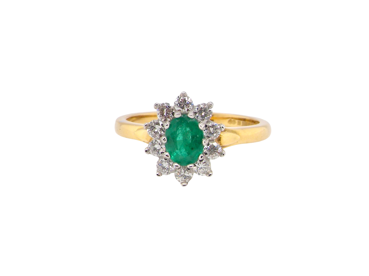 An 18 carat gold Emerald and Diamond cluster ring