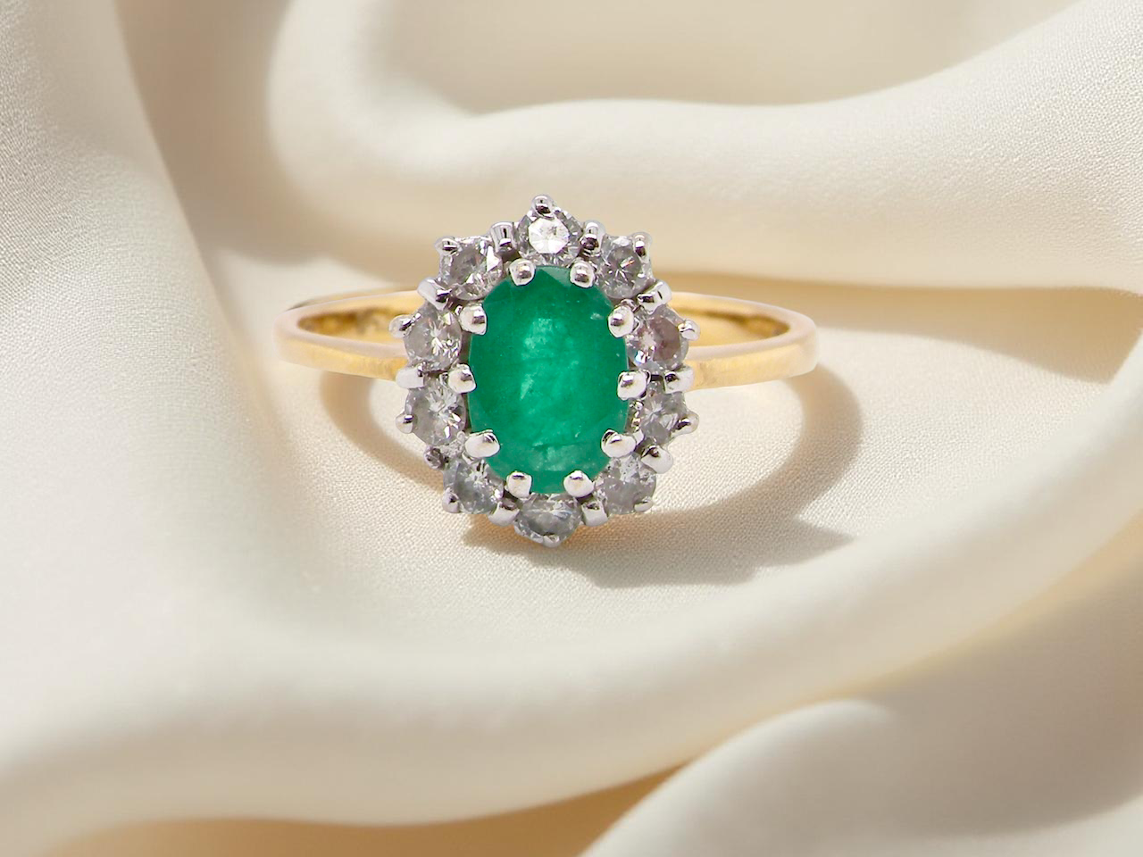 A 1980s traditional Emerald and Diamond Ring