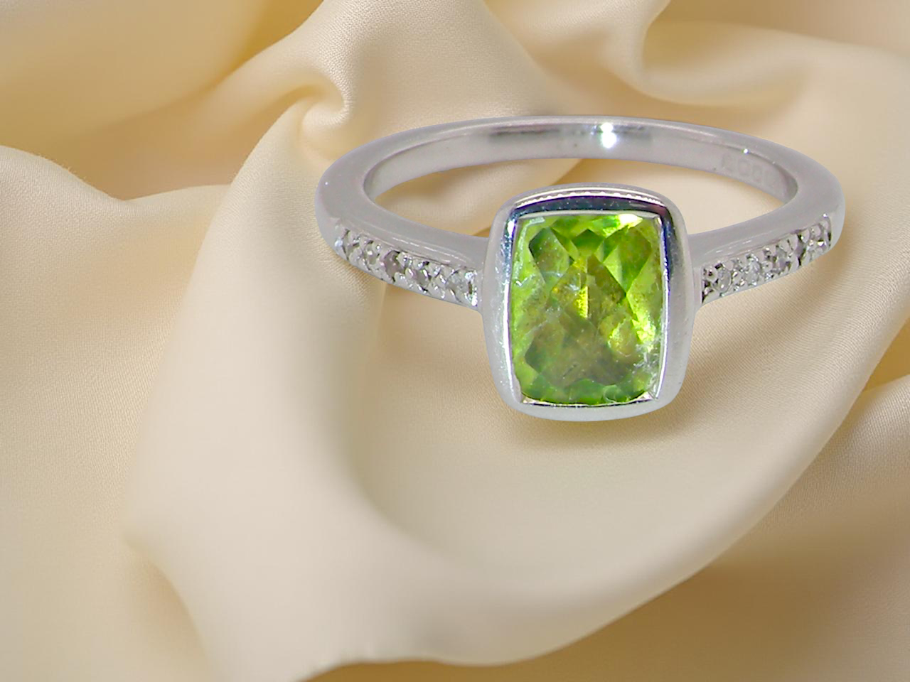 A 9 Carat White Gold Peridot &amp; Diamond Ring