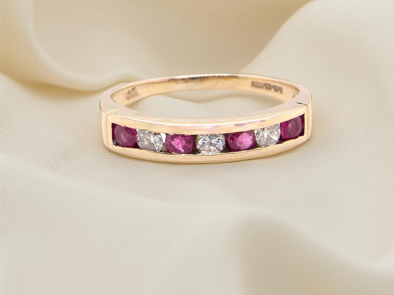 A 9 carat Yellow Gold Ruby &amp; Diamond Eternity Ring