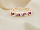A 9 carat Yellow Gold Ruby &amp; Diamond Eternity Ring