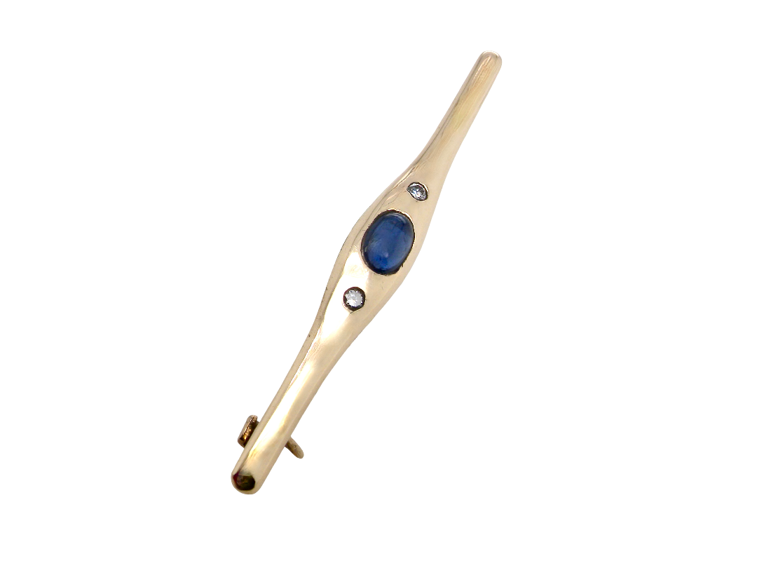 A 9 carat gold bar brooch, width 55mm. Set with a cabouchon sapphire,