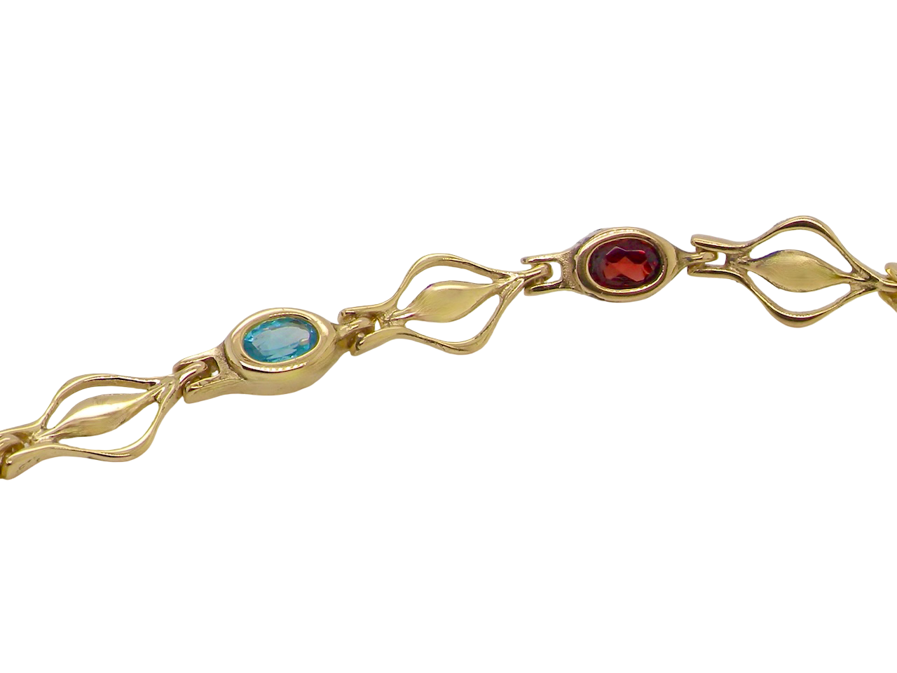 A 9 carat gold bracelet. Set with various gemstones, all oval cut. close up
