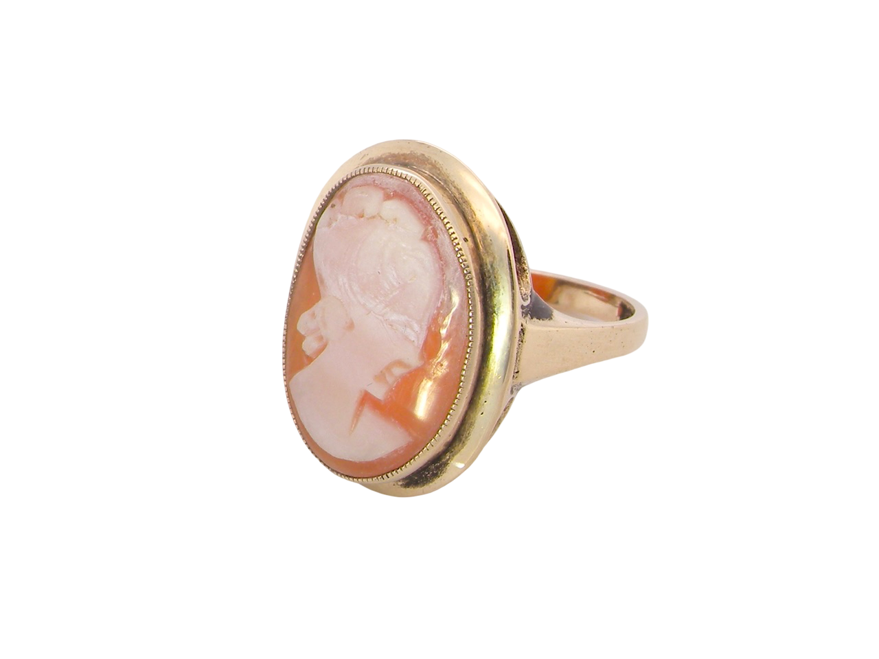 A 9 carat gold dress ring that features a cameo shell. Carved with the head of a young woman. 