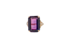 A 9 carat gold* dress ring that is set with a substantial amethyst gemstone.
