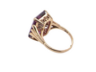side A 9 carat gold* dress ring that is set with a substantial amethyst gemstone.
