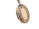 A 9 carat gold locket*, oval shaped, measures 30x20mm, 