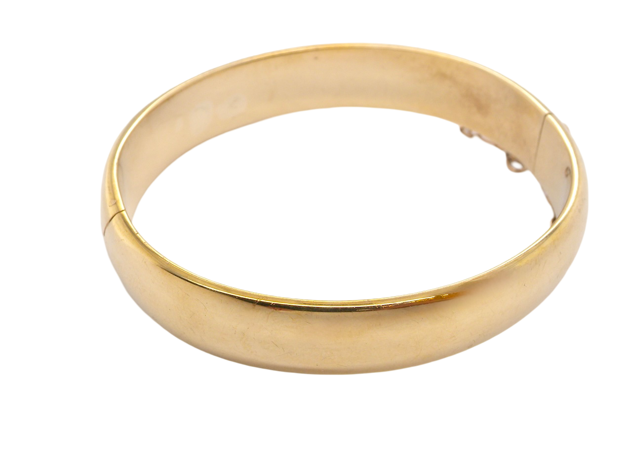 A plain gold bangle