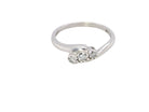 A 9 carat white gold cross over style trilogy ring. Three x 0.10mm diamonds, to an estimated at 0.30 carats.