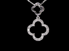 A 9 carat white gold pendant in the 'Alhambra' style. Set with twenty four small  diamonds, carat total 0.12 carats.
