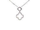 A 9 carat white gold pendant in the 'Alhambra' style. Set with twenty four small white diamonds, carat total 0.12 carats.