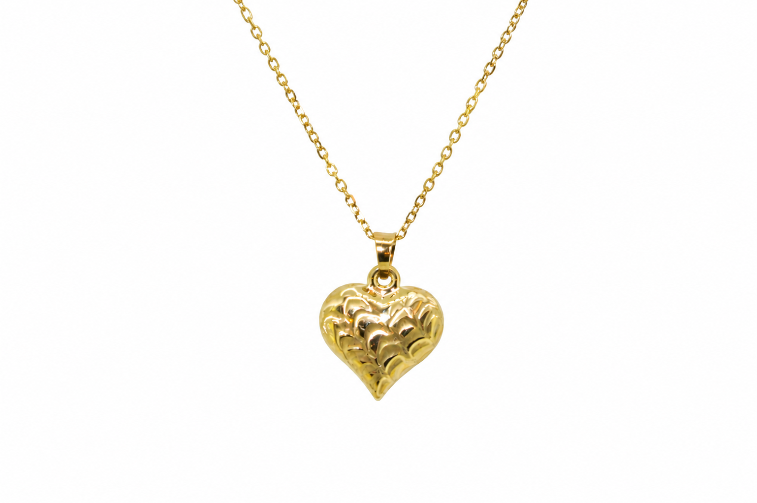 A 9ct gold patterned heart pendant