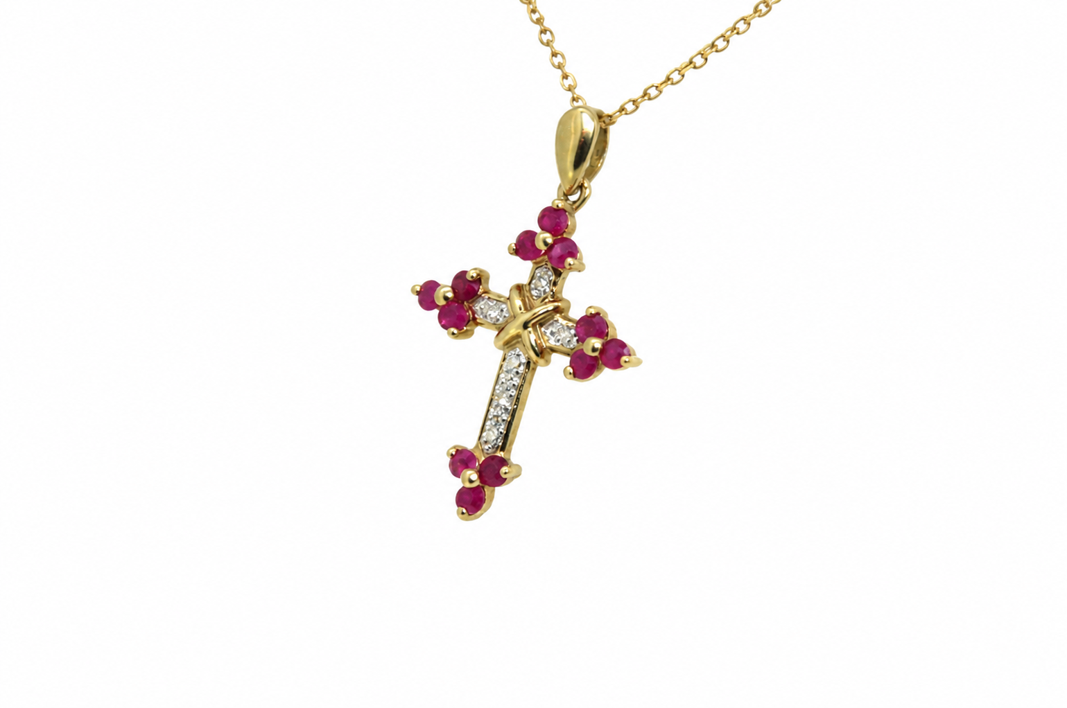 Side view of ruby and diamond cross