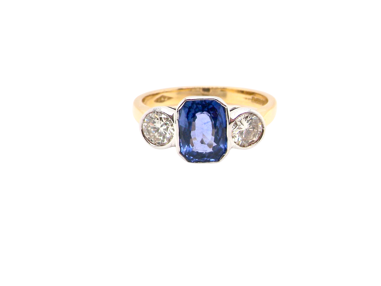 A three stone Sapphire and Diamond ring