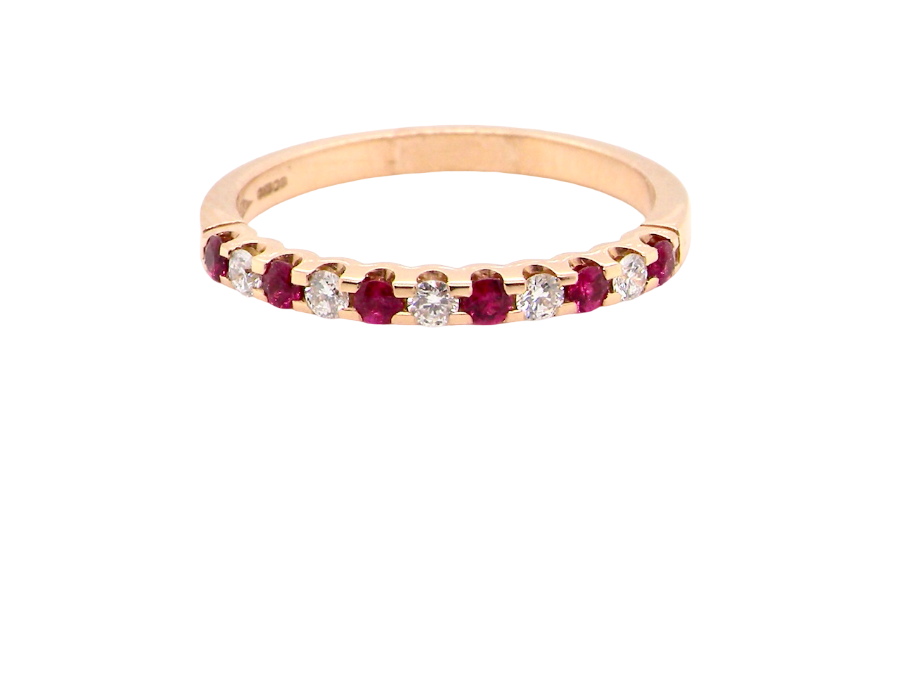 An 18 carat Ruby and Diamond eternity ring