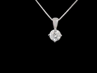 A Platinum Solitaire Diamond Pendant
