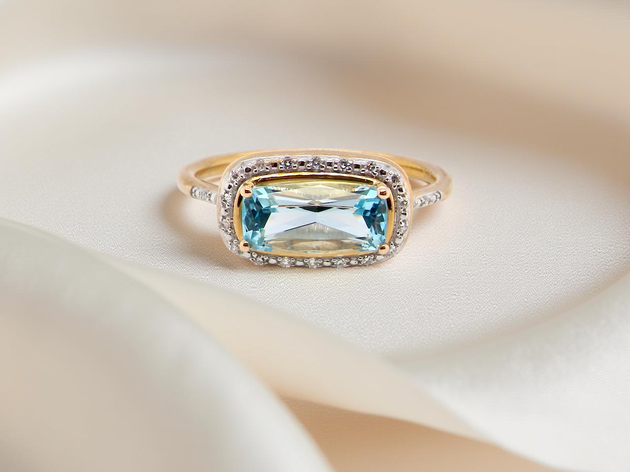 A Modern Blue Topaz & Diamond Cluster Ring