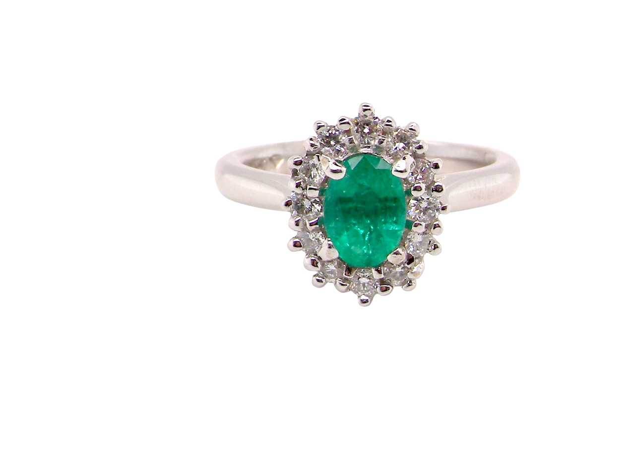 A NEW Emerald and Diamond ring