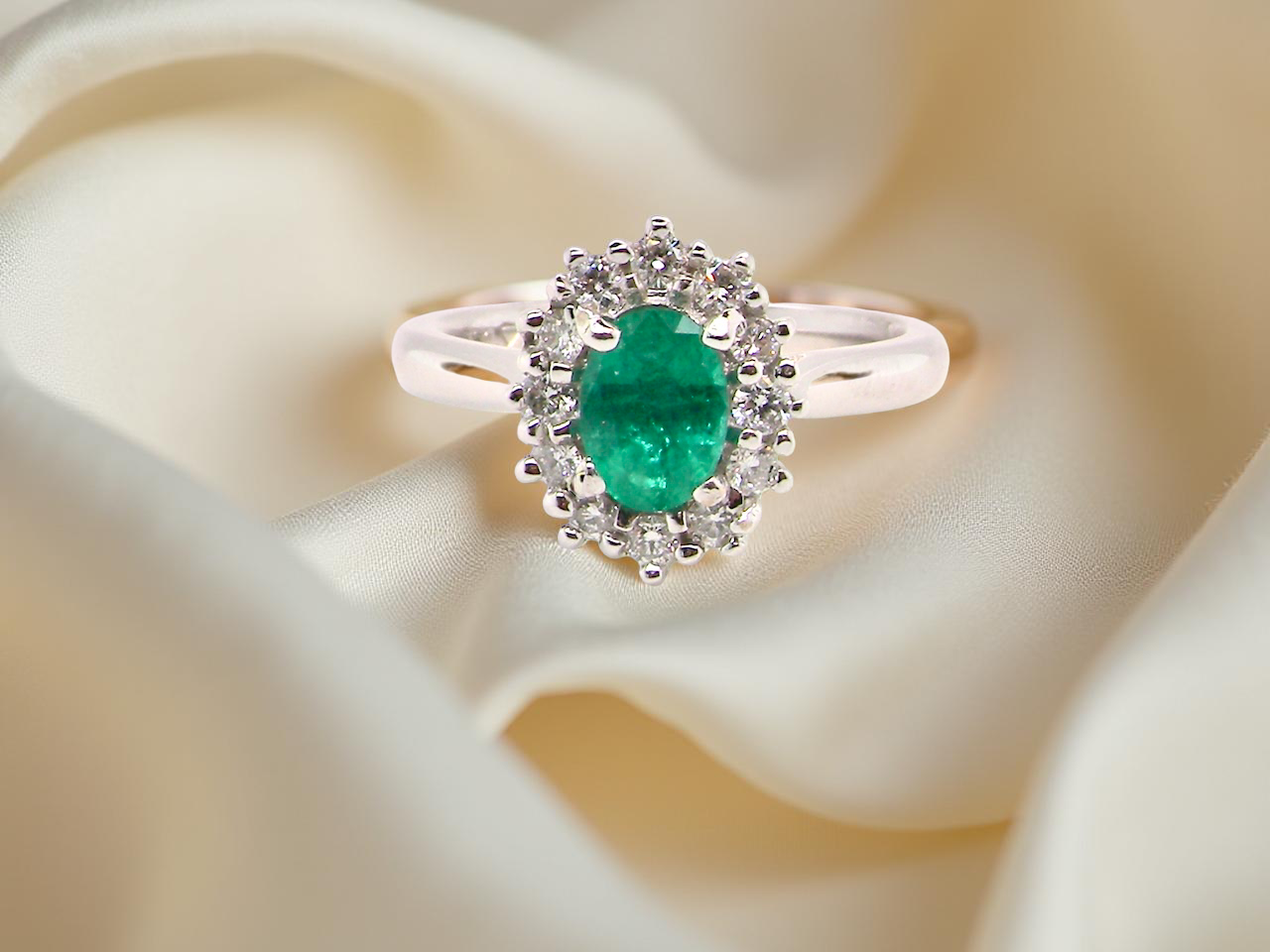 A NEW Emerald and Diamond ring
