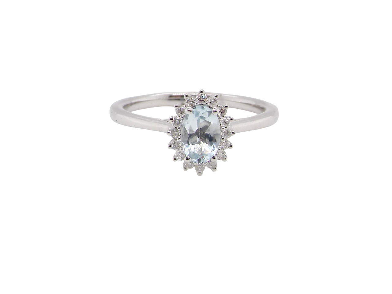 A NEW blue topaz and diamond ring