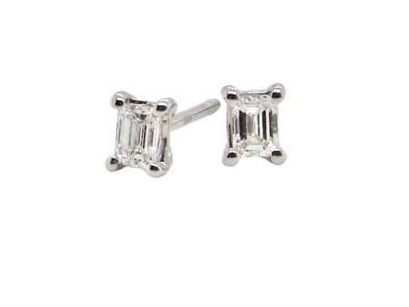 A NEW pair of emerald cut diamond stud earrings