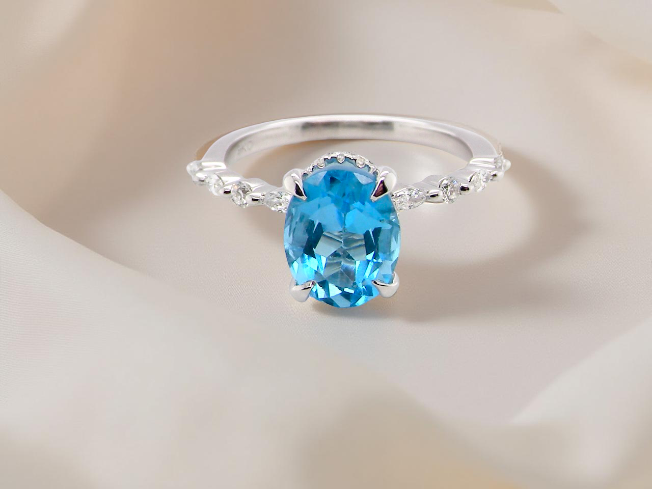 A NEW ring- but with a gemstone that we have taken from an old ring that was worn out, so its a new lease of life!&nbsp; topaz measures 9x7mm.