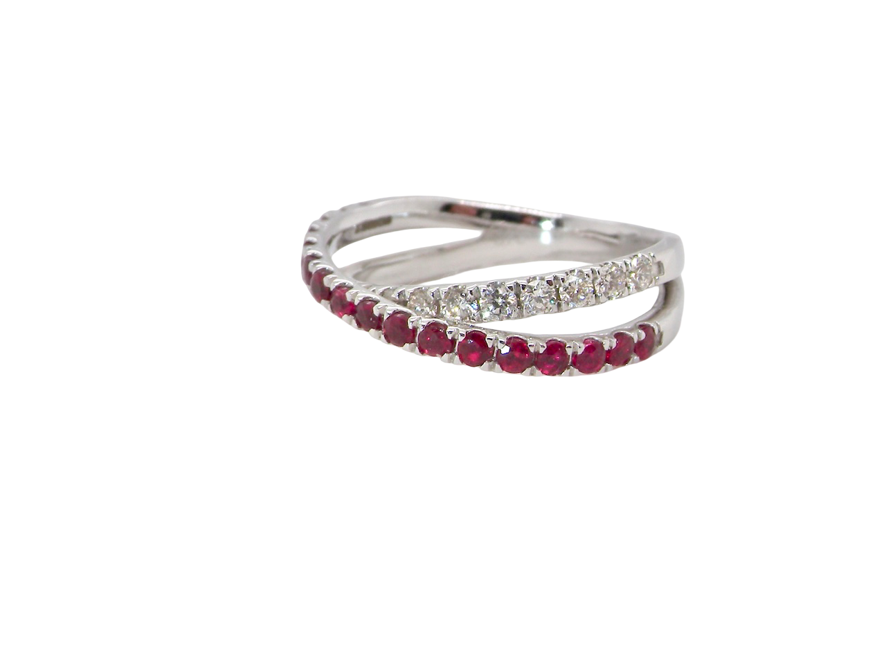 A NEW ruby and diamond cross over ring