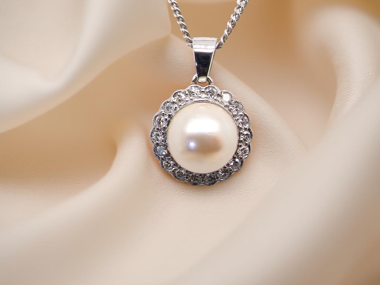 A Pearl and Diamond pendant