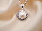 A Pearl and Diamond pendant
