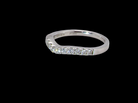 A Platinum half hoop ring featuring a gently contoured U-shaped centre, designed to allow a cluster or solitaire ring to sit comfortably alongside. side