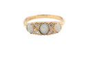 A Victorian style opal and diamond ring