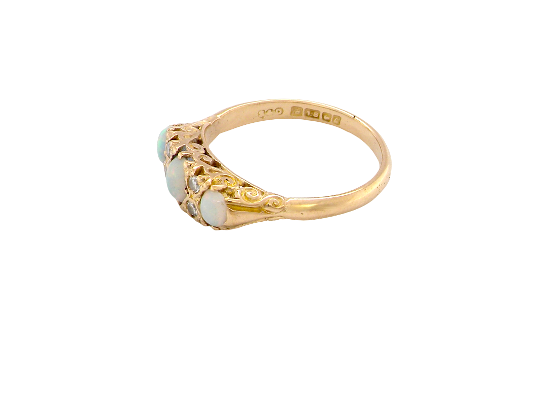 A Victorian style opal and diamond ring side