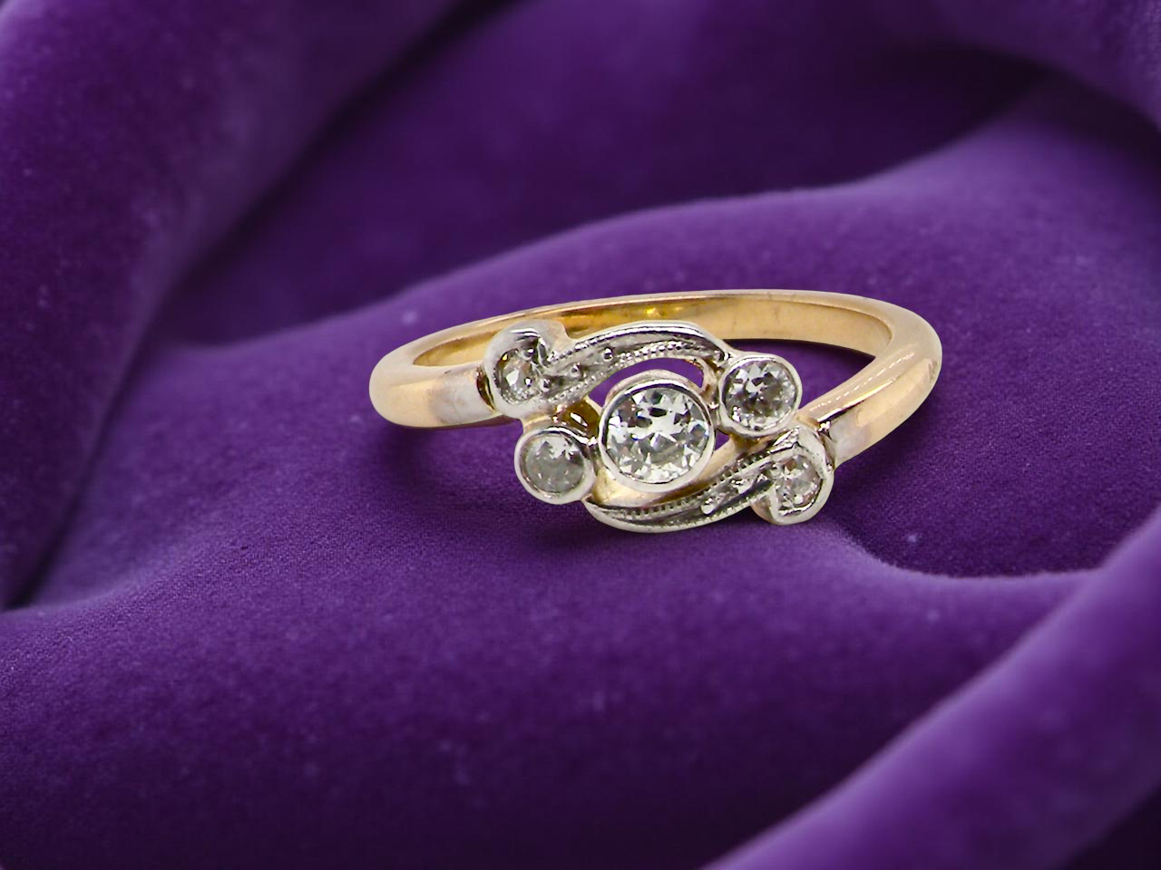 A Vintage Platinum &amp; 18 carat Gold Diamond Crossover Ring (c.1930–1940)
