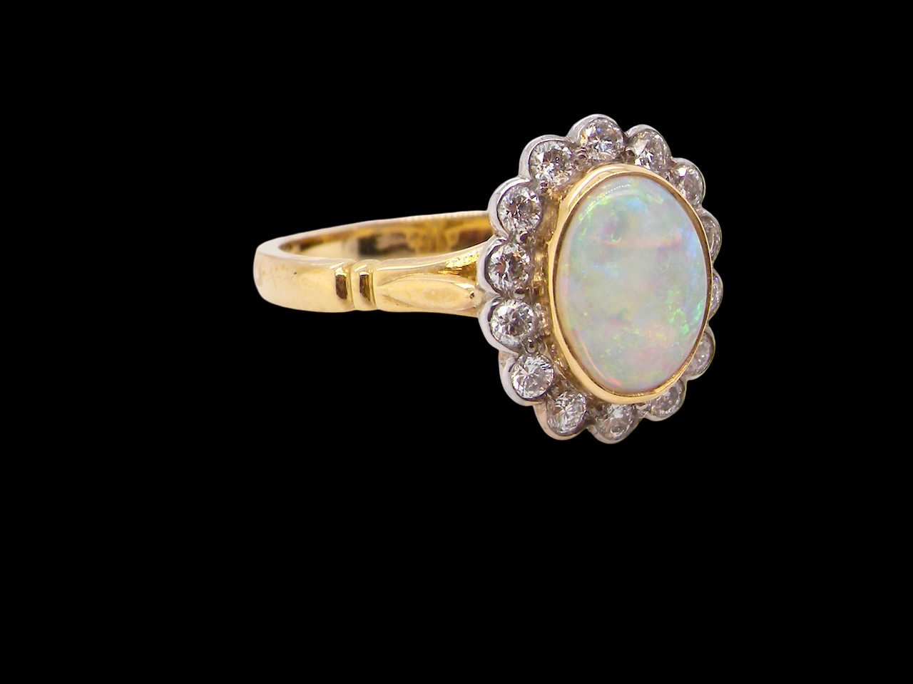 A White Opal and Diamond Ring